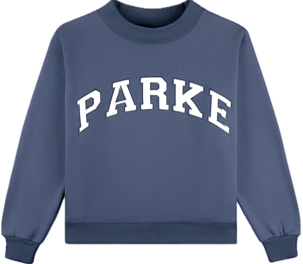 varsity mockneck flat lay -sapphire + white