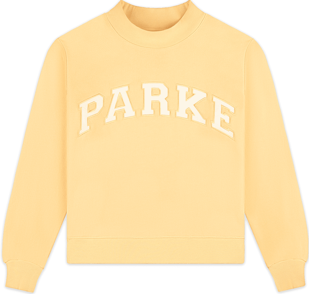 heritage varsity mockneck flat lay -peel + white